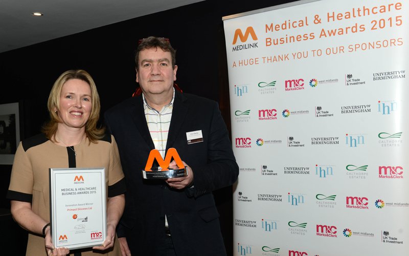 Caroline Herdman & Clive Denley receive the Medilink award from the Primasil project team.jpg